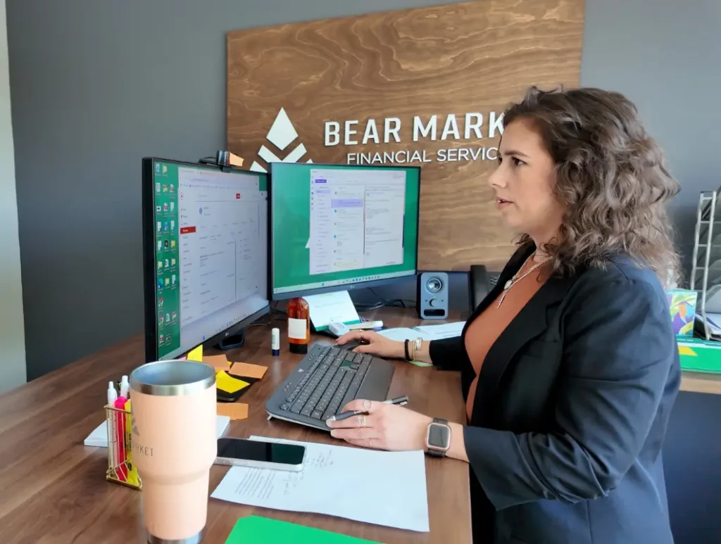 Woman at dual monitor setup